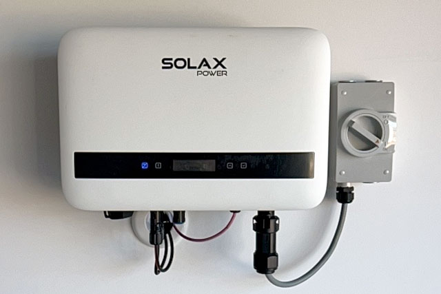 Existing solar inverter on a wall